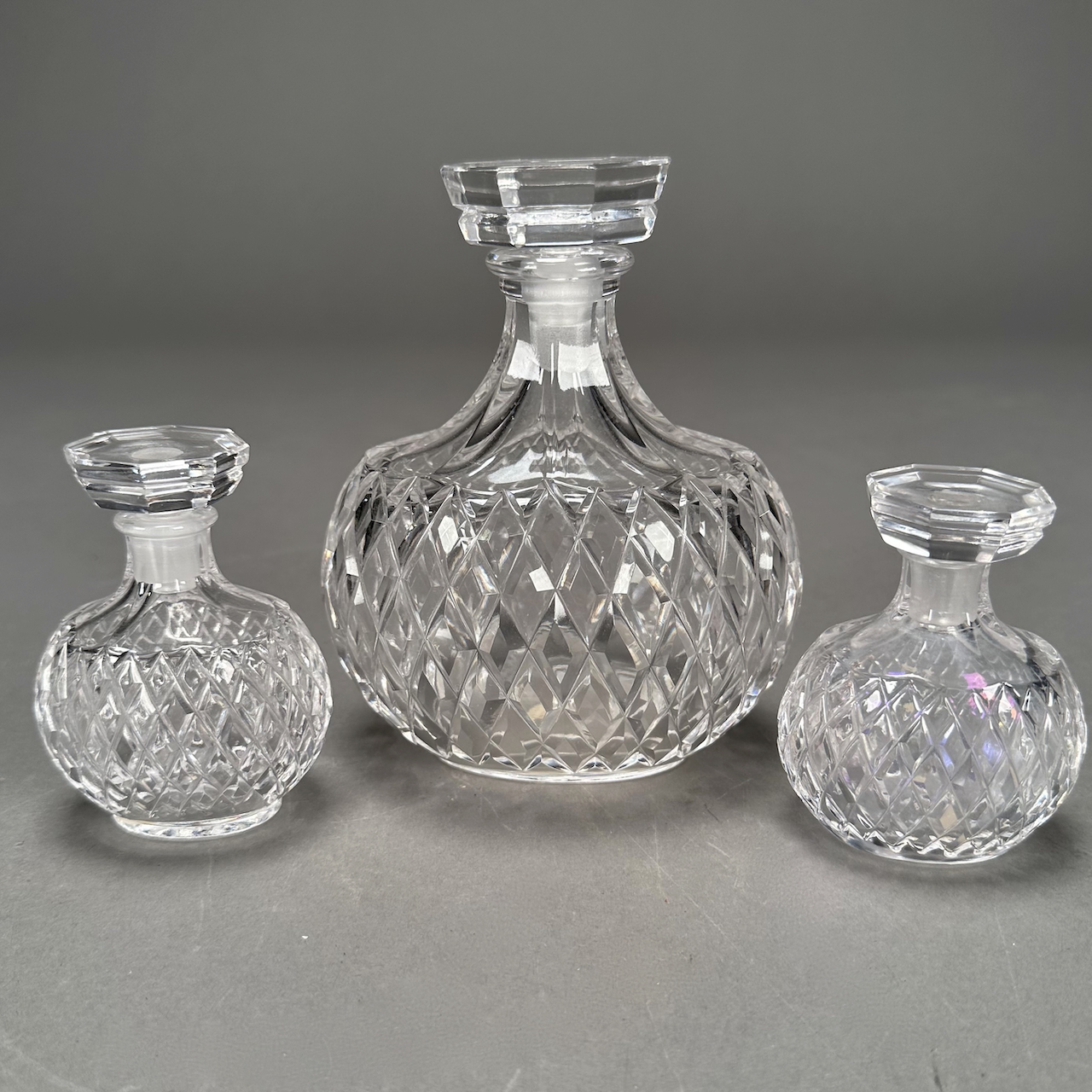 LOT 045 SET OF 3 LALIQUE PERFUME BOTTLES, 6″ AND 2 (3-1/2″), FOR NINA ...